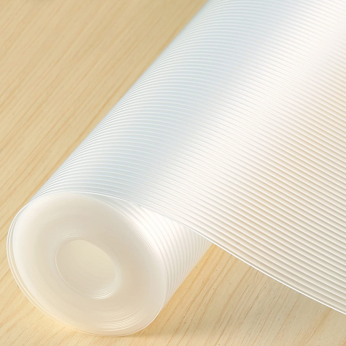 Iwtmm shelf liner with non-slip texture keeps items in place.