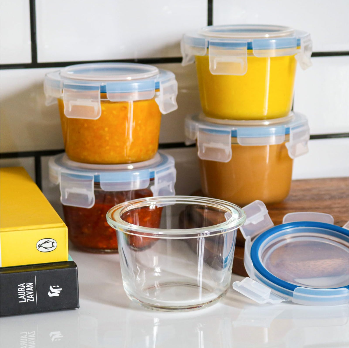 Iyulania 7oz glass containers with airtight lids for leftovers.