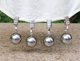 Iyulania curtain weights provide rust-proof stability for drapes.