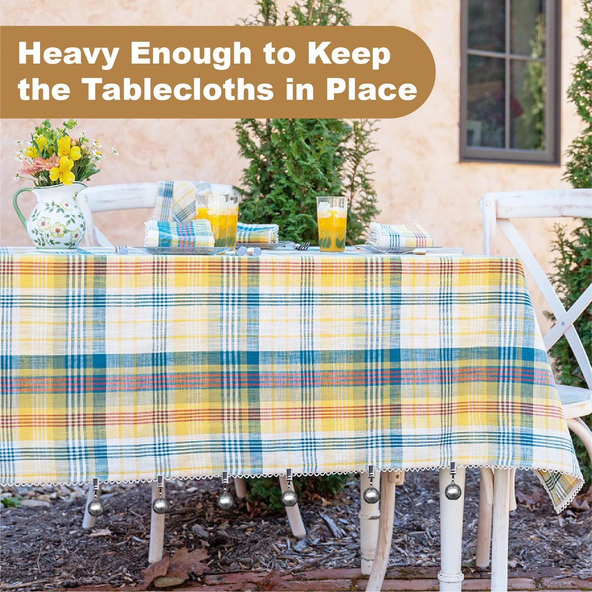 Iyulania stainless steel weights keep tablecloths in place on breezy days.
