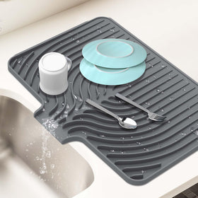 JACZZO dish drying mat with drain lip keeps countertops dry after dishes.