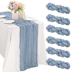 JALANCY dusty blue table runner laid across a table for elegant dining.