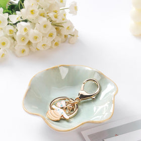 Compact JAMEND CLXP jewelry tray sized 4.3 by 3.7 inches on a dresser.