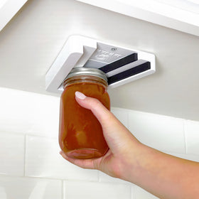 Jar Jaw under-cabinet jar opener demonstrates space-saving placement and easy access