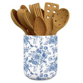 JarThenaAMCS utensil holder with blue flowers keeps countertops organized.
