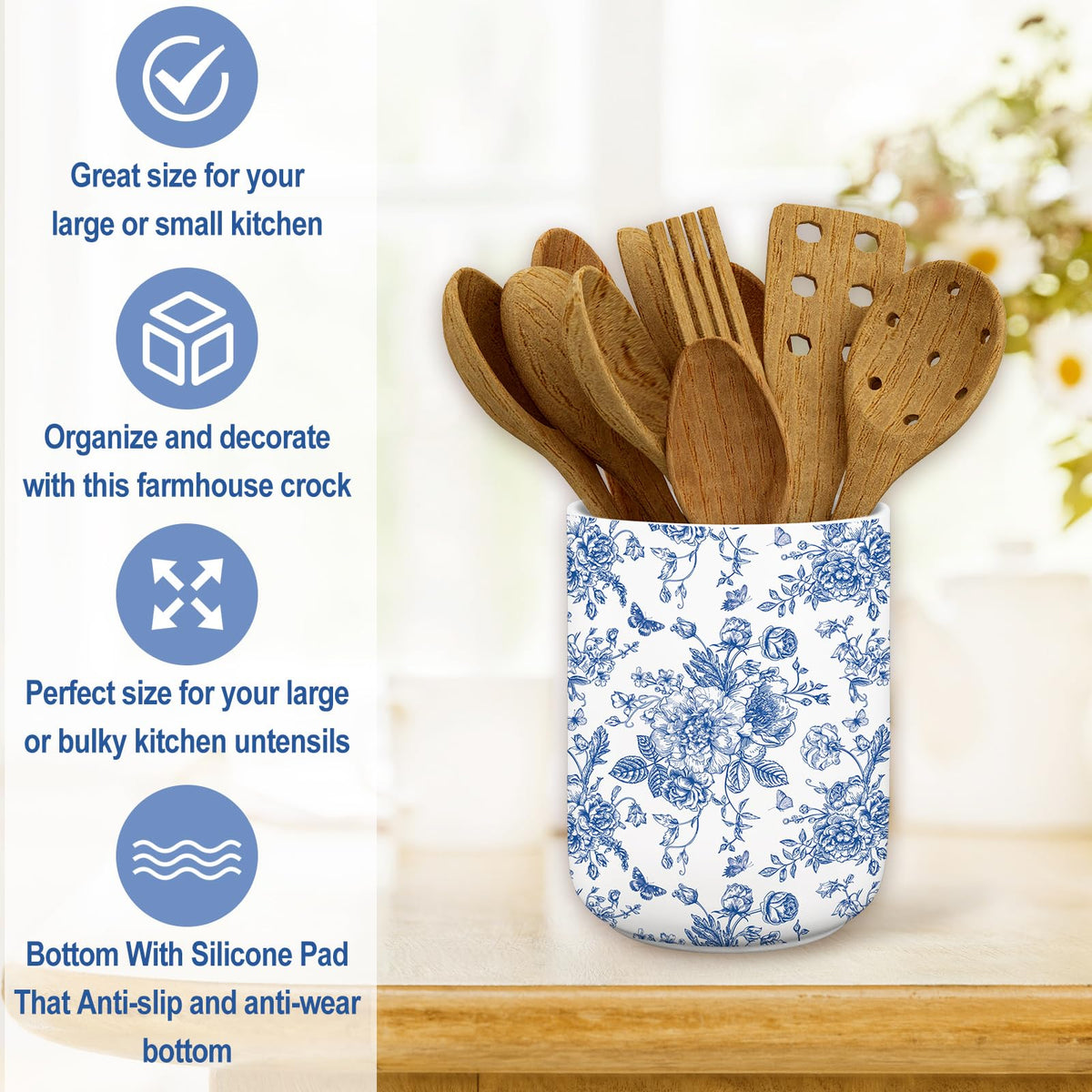 JarThenaAMCS blue flower utensil holder reinforces kitchen organization and accessibility.