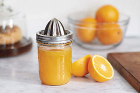 Jarware 82654 juicer lid with top reamer for quick lemon and lime juice.