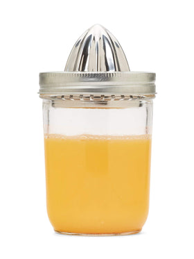 Jarware 82654 citrus juicer lid on a wide-mouth jar for fresh juice at home.
