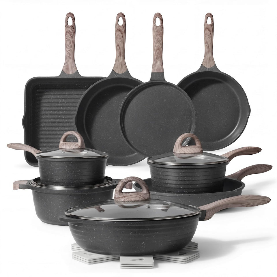JEETEE 23-piece pots and pans set on induction stove delivering even heating.