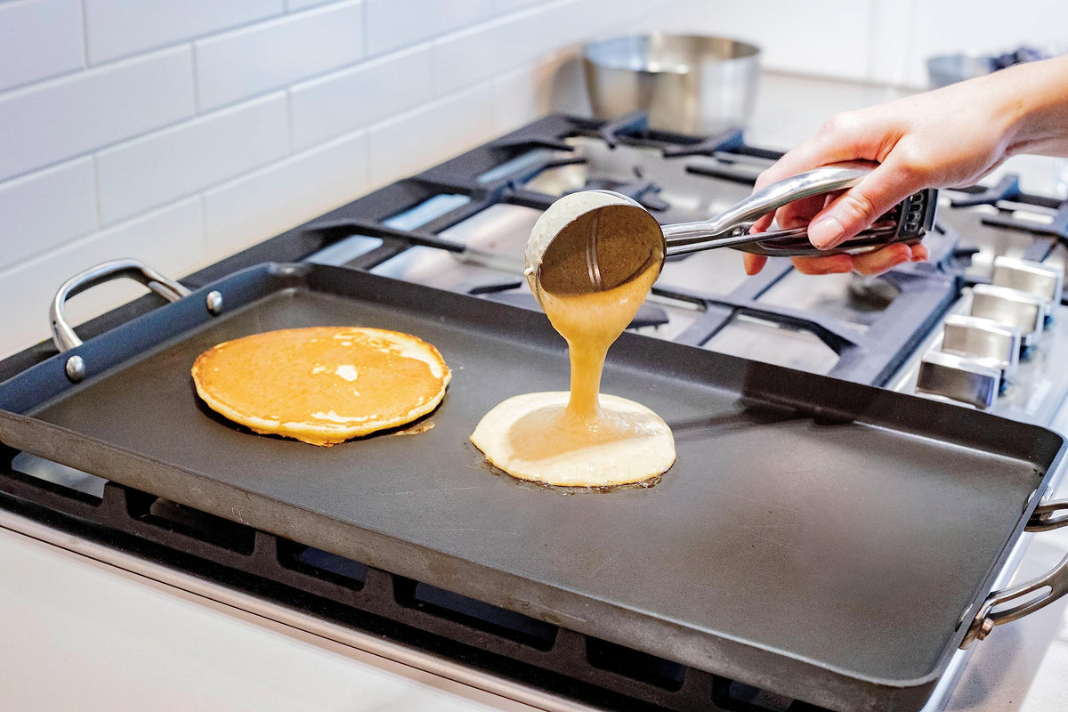 Jenaluca uniform-portion scoop helps even baking and presentation.