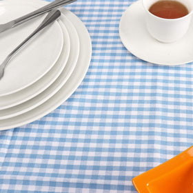 Jennice House wedding dinner scene with blue gingham tablecloth.