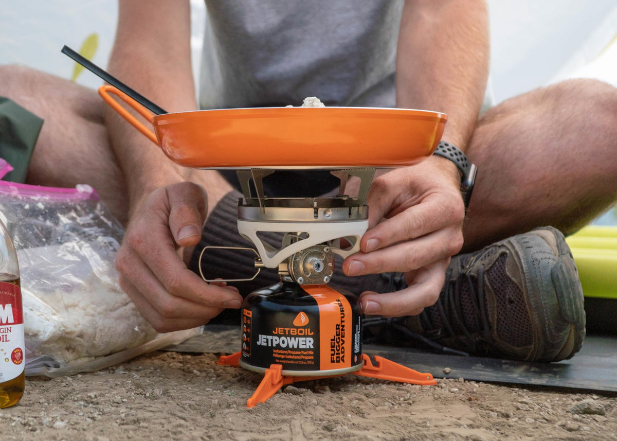 Jetboil Summit Skillet egg-release closeup demonstrates clean cooking experience