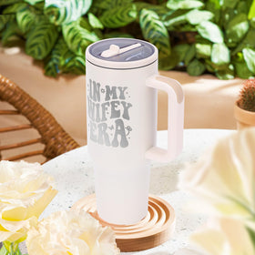 Jetikon In My Wifey Era tumbler with straw keeps drinks fresh during outdoor activities.
