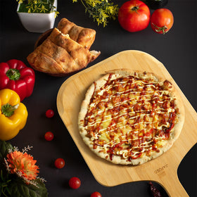 JIAFUEO pizza peel multipurpose board used as cutting board for fruits and bread.
