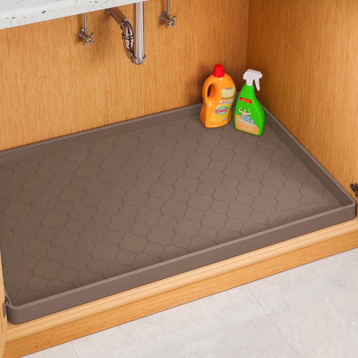 Jin&Bao under-sink mat provides full-coverage protection against leaks.