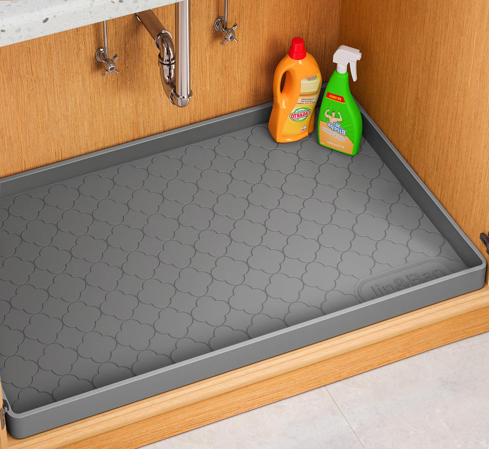 Jin&Bao under-sink mat 37x22 side view protects cabinets from spills.