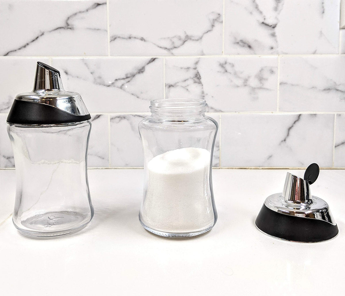 J&M DESIGN sugar dispenser compact design fits in tight kitchen spaces.