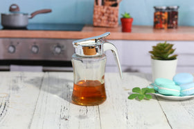 J&M DESIGN chrome lid adds modern style to any kitchen.