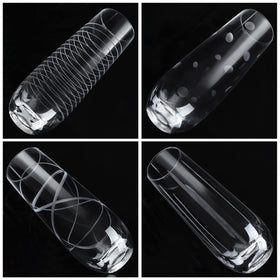 Joeyan etched champagne flutes with crossed lines pattern add sophistication to gatherings.