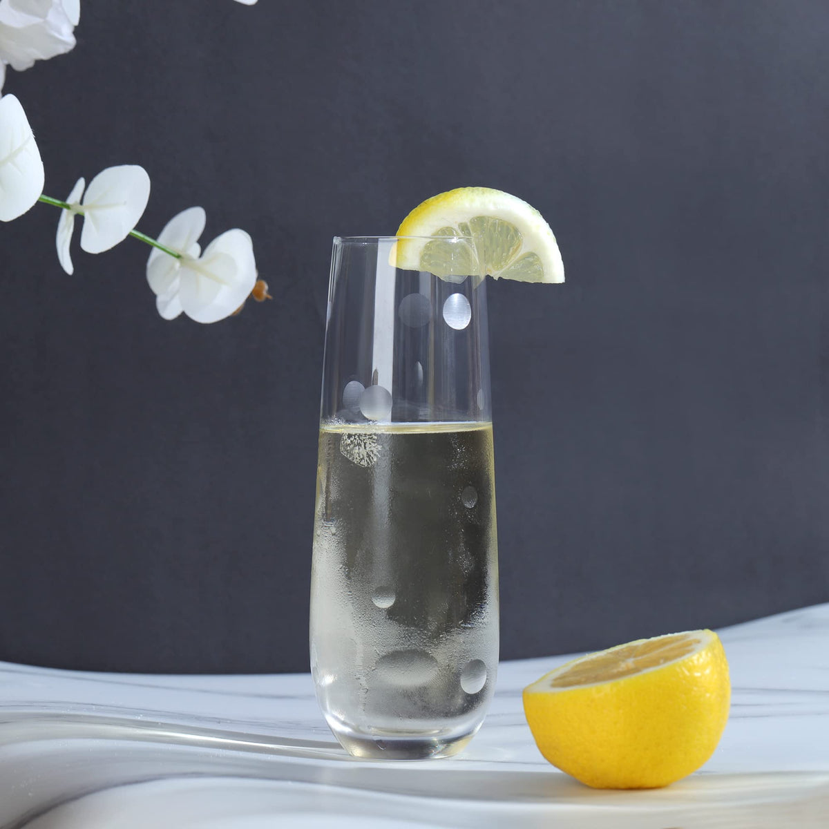 Joeyan etched champagne flutes with geometric designs offer a gift-ready option.