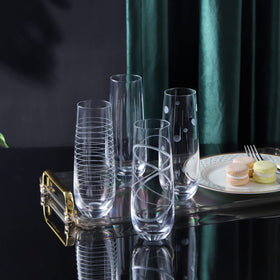 Joeyan etched champagne flutes with swirls pattern enhance celebrations and home bar.