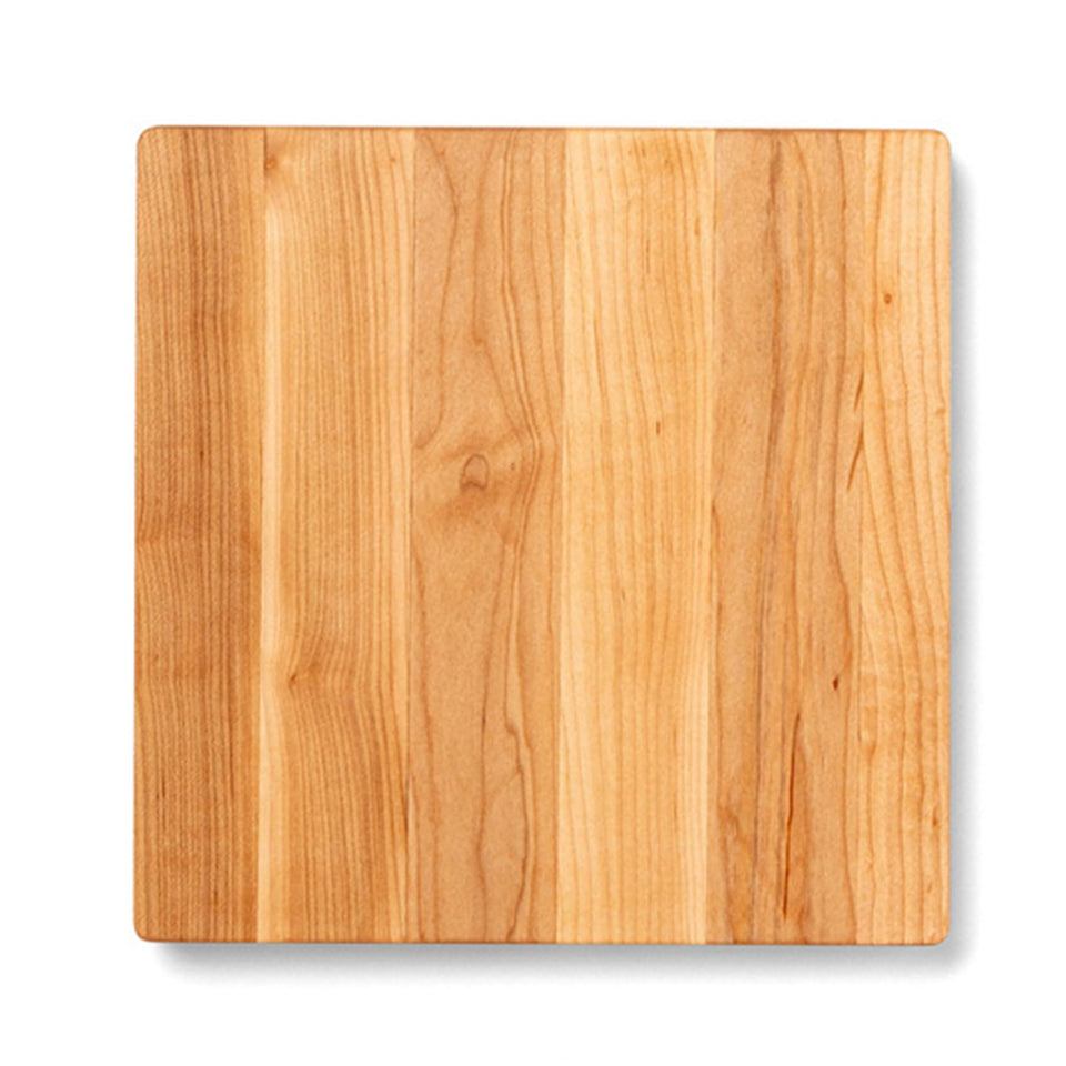 John Boos Chop-N-Slice square maple cutting board 10x10 with beveled edges for precise chopping.
