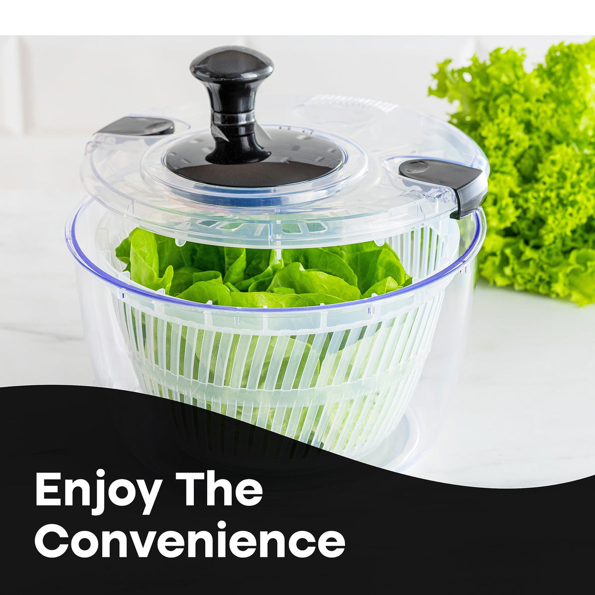 Joined salad spinner locking clamps prevent splashes during use