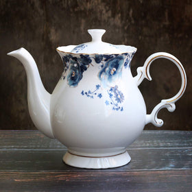 Jomop teapot with handle and spout angle showcasing ergonomic pouring and vintage charm.
