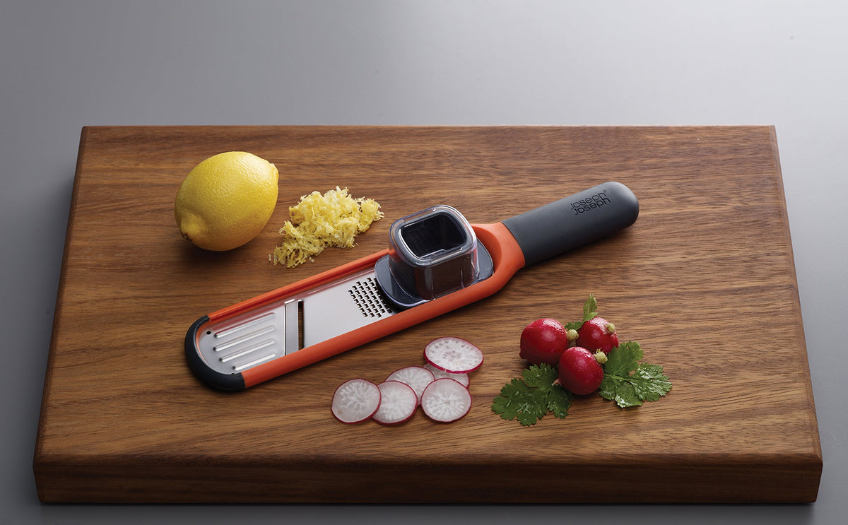 Joseph Joseph 2-in-1 Mini Grater & Slicer ergonomic handle supports comfortable grip.