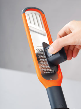 Joseph Joseph 2-in-1 Mini Grater & Slicer ideal for mincing garlic and grating ginger.