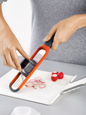 Joseph Joseph 2-in-1 Mini Grater & Slicer protective sheath for safe storage.