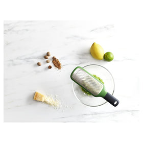 Joseph Joseph grater keeps fingers away from blades during use.