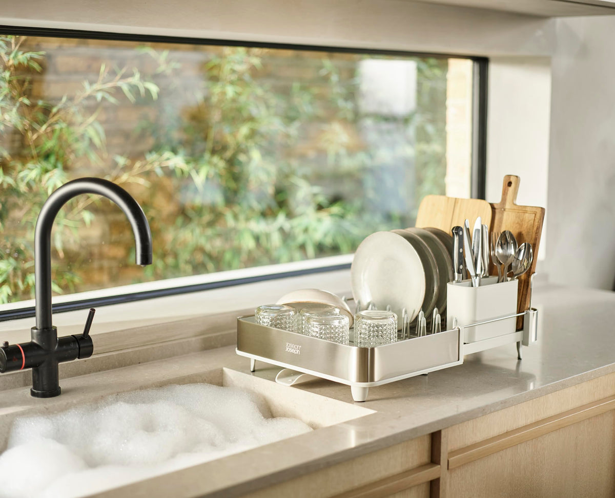 Joseph Joseph Extend Steel dish rack highlights non-scratch prongs and movable cutlery holder for safe, organized drying.