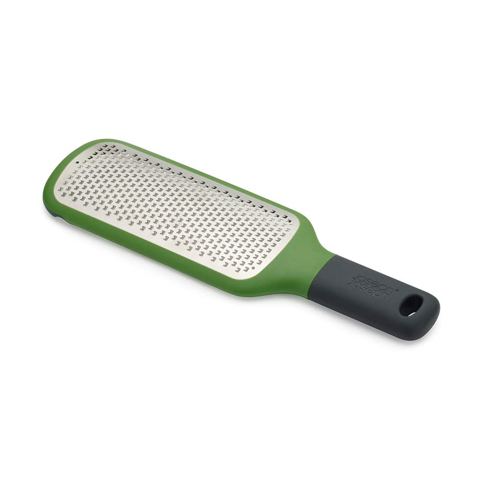 Joseph Joseph Fine Grater & Zester hooks over a bowl for easy grated cheese collection.