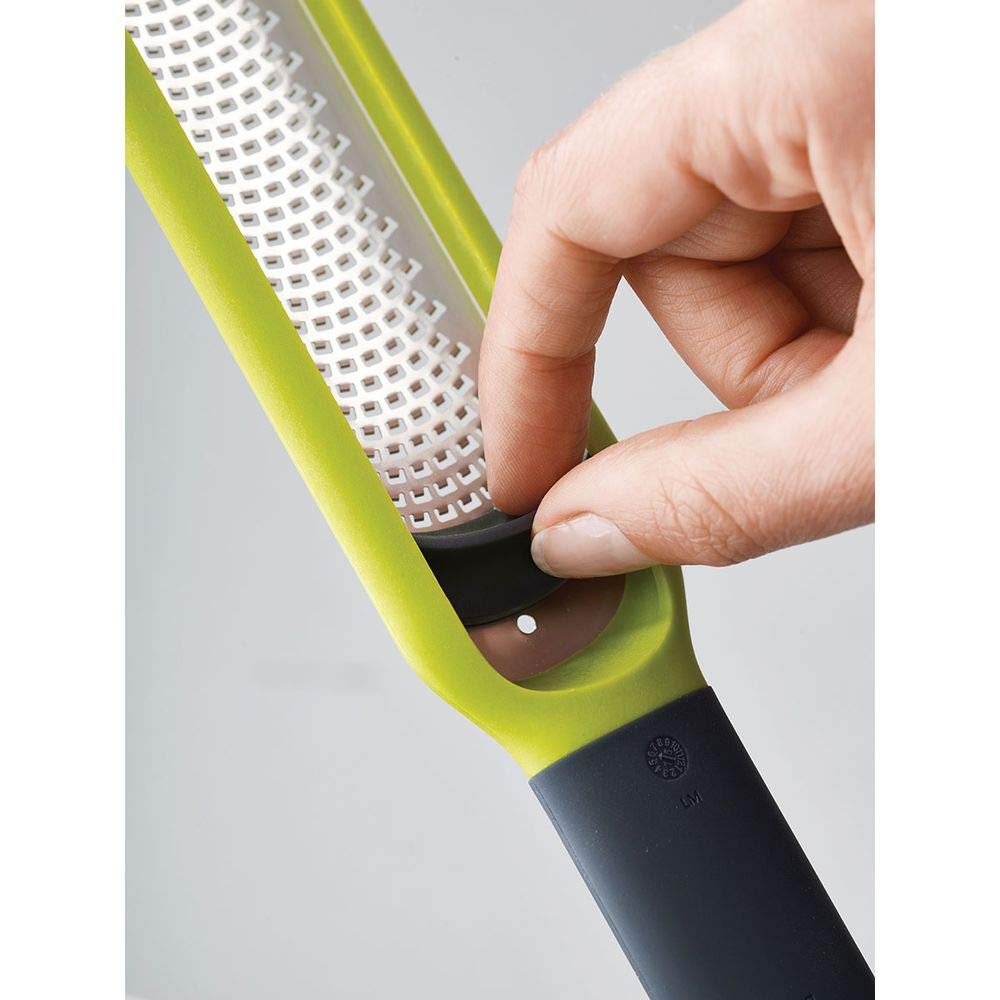 Joseph Joseph Handi-Zest zester collects zest from blade for cleaner prep