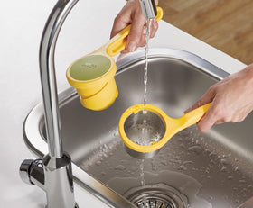 Joseph Joseph Helix Citrus Press dishwasher-safe two-piece design for quick cleaning.