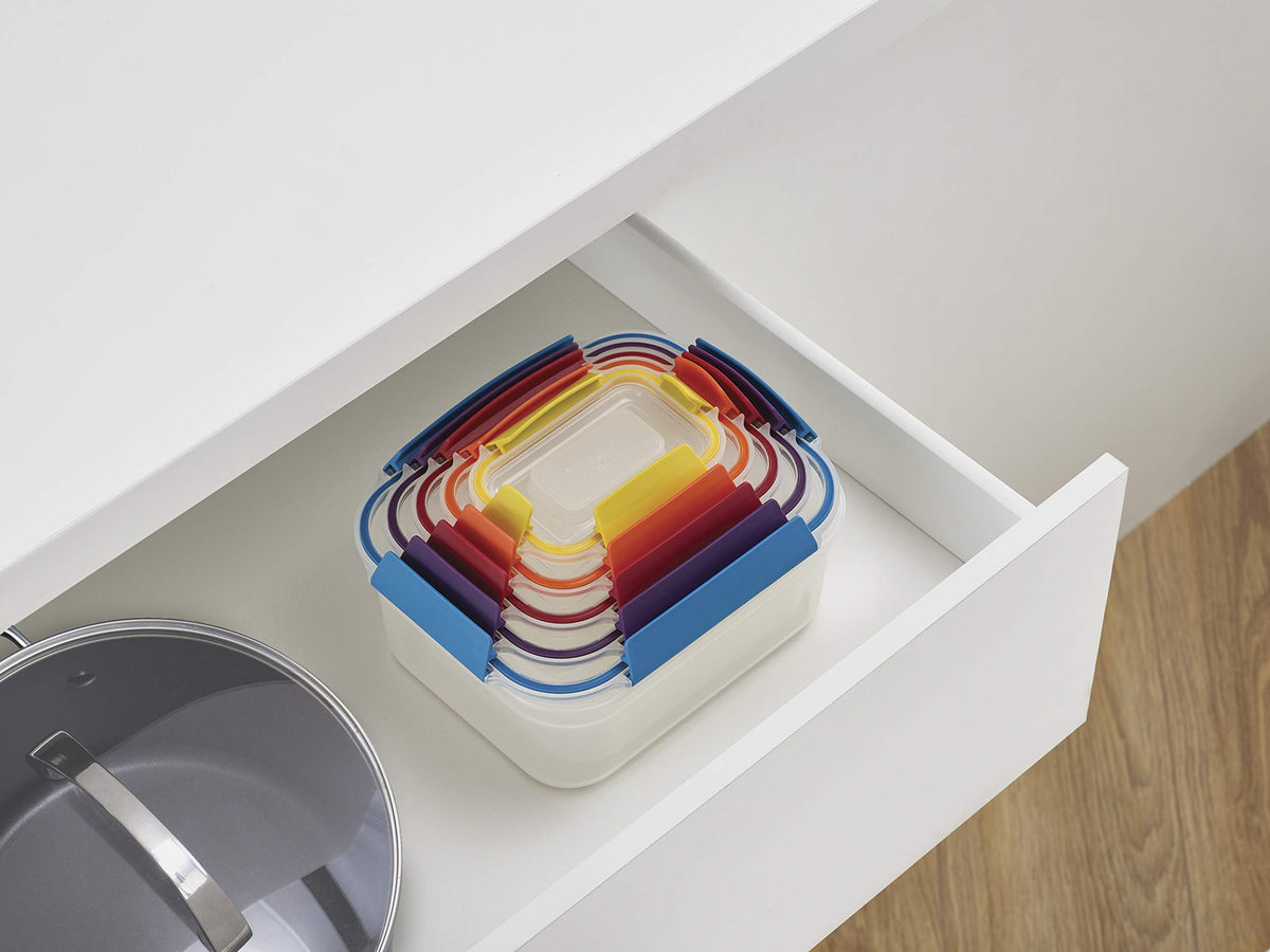 Joseph Joseph Nest Lock lids clipped together for space-saving organization.