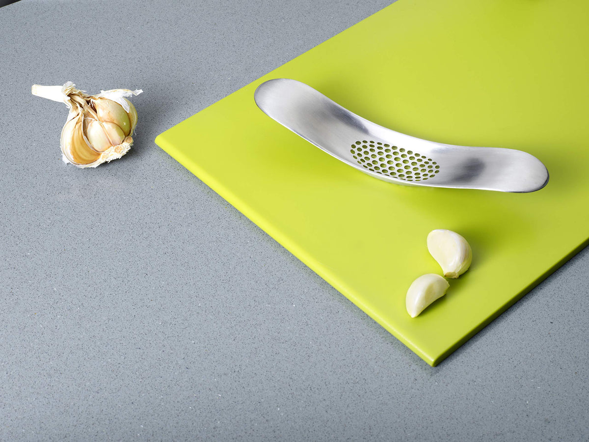 Joseph Joseph odor-reducing stainless steel helps with garlic smell on hands.