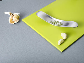 Joseph Joseph odor-reducing stainless steel helps with garlic smell on hands.