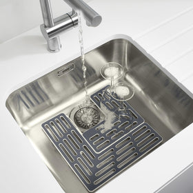 Joseph Joseph Sinksaver modular setup adapts to different drain positions.