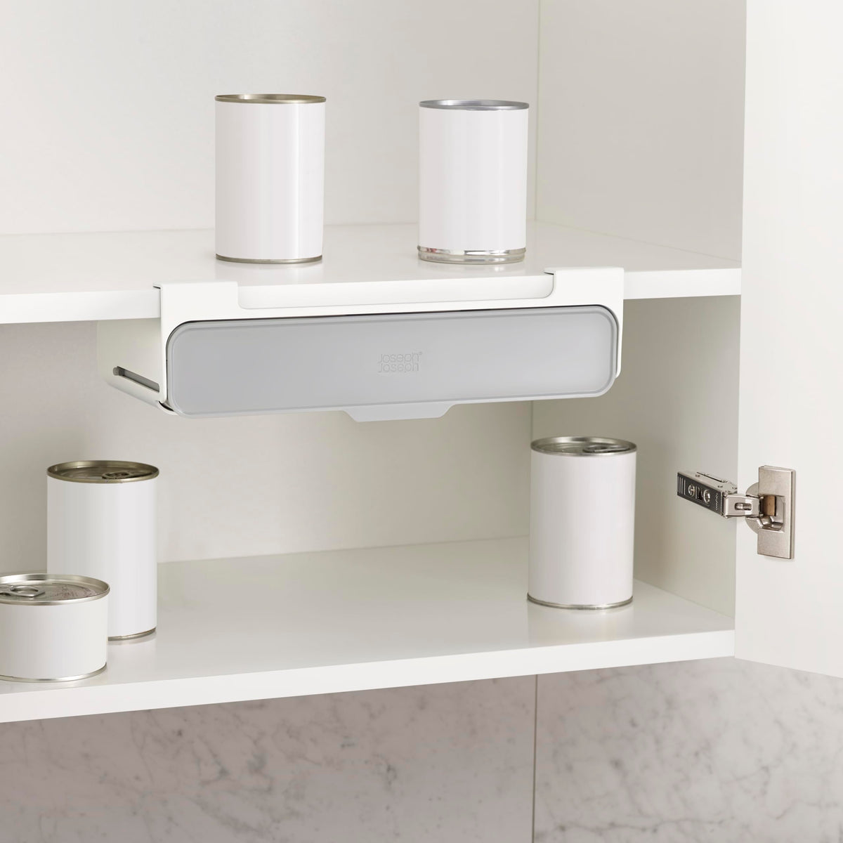 Joseph Joseph spice rack pull-out drawer demonstrates easy access to jars in your cabinet.