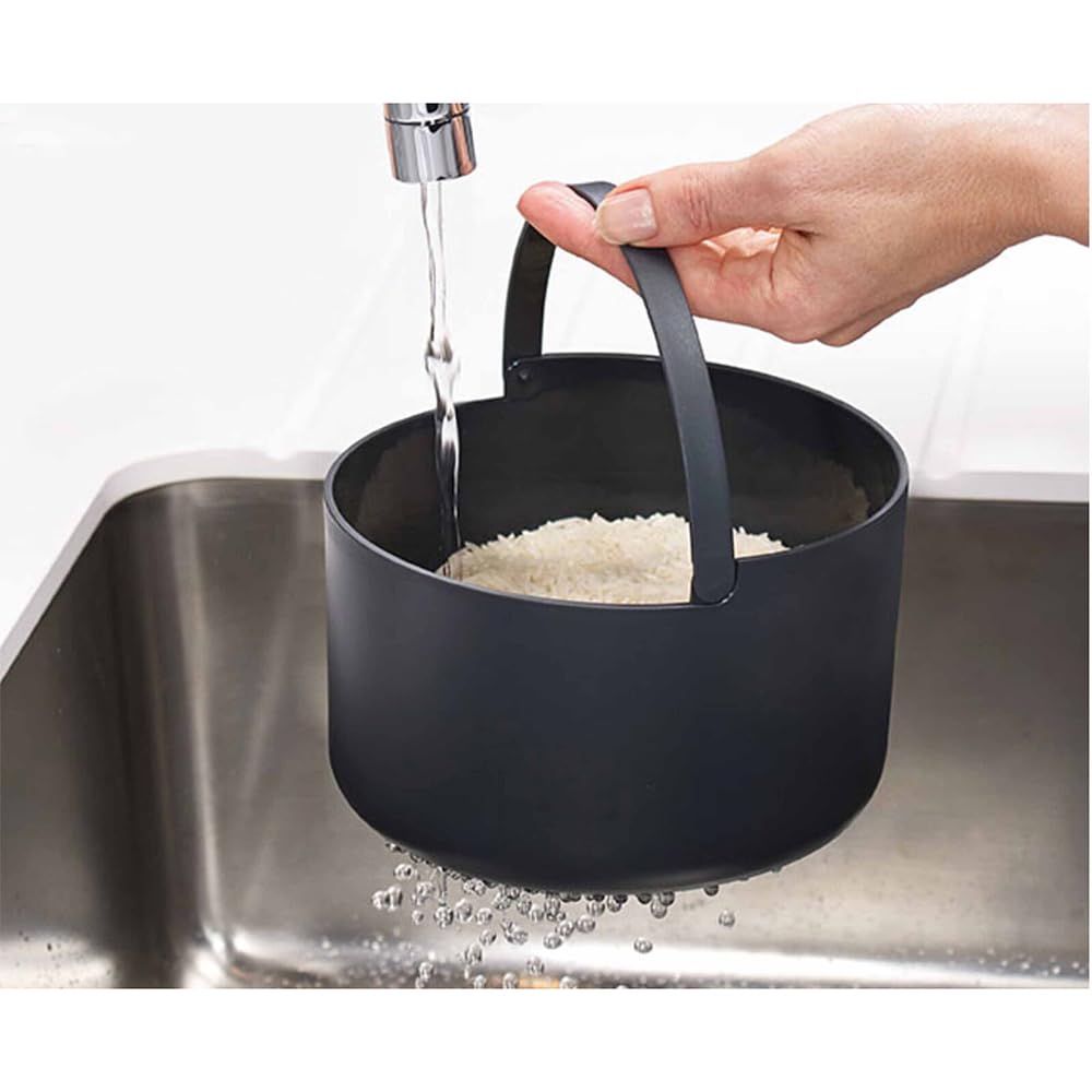 Joseph Joseph M-Cuisine rice paddle for fluffing and serving rice.