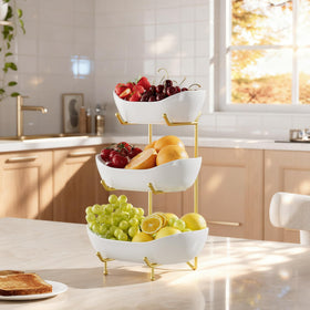 Josmimic gold stand adds elegant contrast to the white ceramic bowls