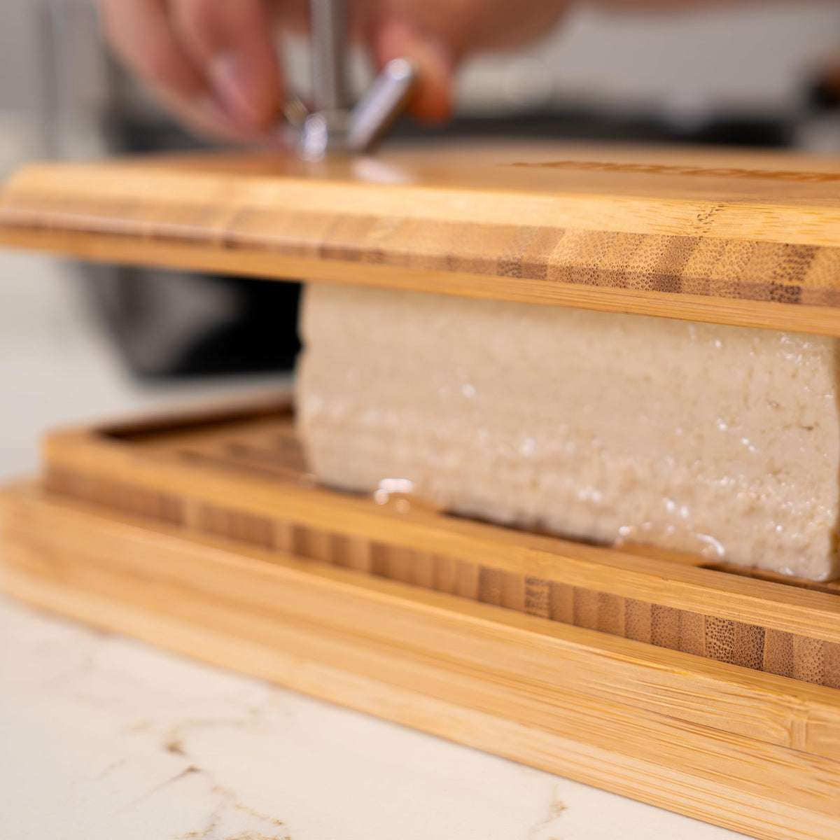 Joyce Chen Bamboo Tofu Press showcases sustainable bamboo construction for durable kitchen tools.
