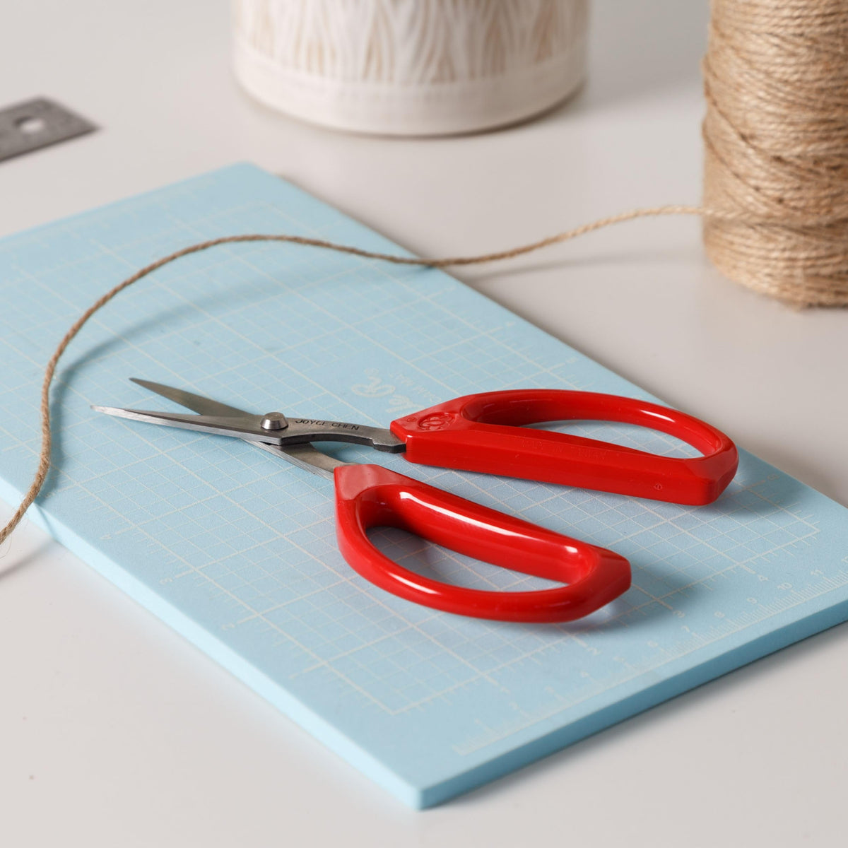 Ergonomic handles on Joyce Chen Unlimited scissors support left and right-handed users.