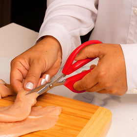 Joyce Chen Original Unlimited Scissors carving lobster tails with ease.