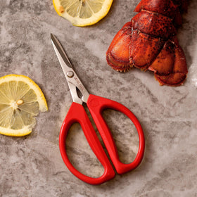 Joyce Chen Original Unlimited Scissors cutting vegetables with sharp, precise blades.