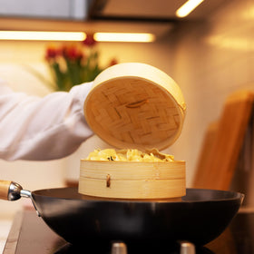 Joyce Chen renewable bamboo steamer emphasizes sustainable kitchen tool.