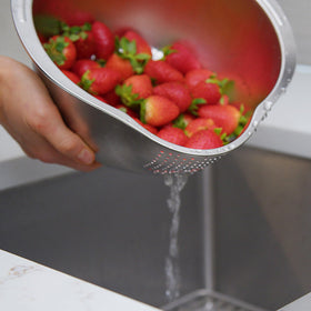 Joyce Chen rice washer bowl agitator bumps highlight starch removal for rice and produce.