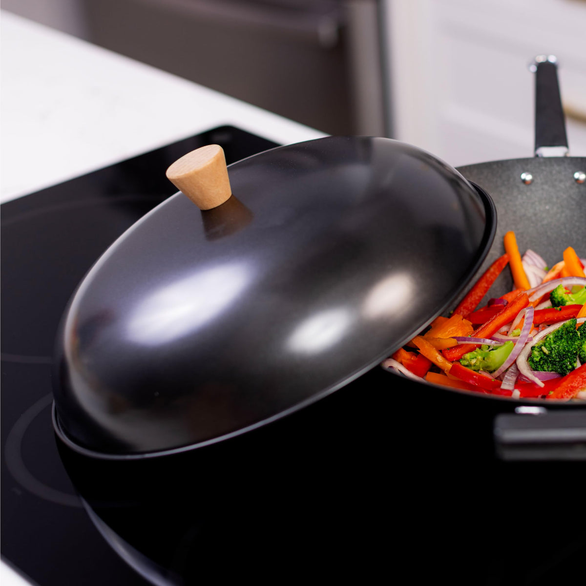 Joyce Chen lid suitable for serving dishes and compatible skillets